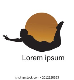 silhouette of person flying on sunset background