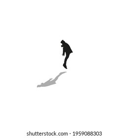 Silhouette of a person jumping. Silhouette of moving man standing in the middle and jumping.