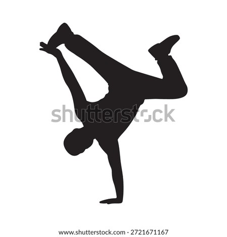 Silhouette of a person performing a dynamic handstand breakdance pose