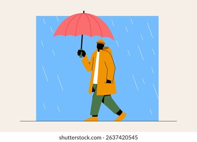 Silhouette of a person walking with umbrella on a rainy autumn day