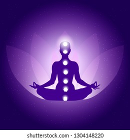 Silhouette of Person in yoga lotus asana on dark blue purple background with lotus flower and light