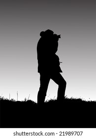 silhouette of photographer