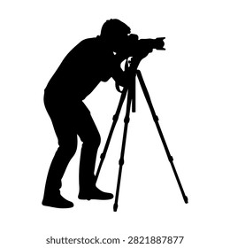 Silhouette of a photographer adjusting a camera on a tripod, capturing outdoor scenes, emphasizing photography, equipment, and outdoor activity.