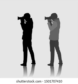 Silhouette of a photographer. Photographer is a young, skinny man. Autumn clothes. Vector.