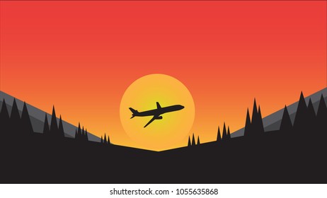 The silhouette of the plane is flying under the sun.