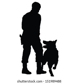 Silhouette of a police officer training with his dog partner 