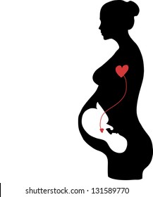 Silhouette of pregnant woman with baby inside