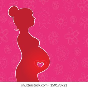 Silhouette of pregnant woman with flower background