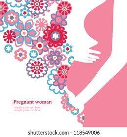 Silhouette of pregnant woman with flowers