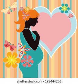 Silhouette of pregnant woman with flowers and butterflies