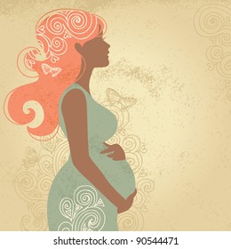 Silhouette of pregnant woman with ornament