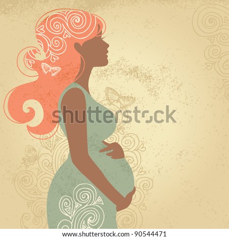 Silhouette of pregnant woman with ornament