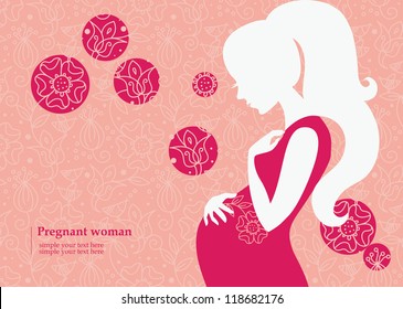 Silhouette of pregnant woman in spring