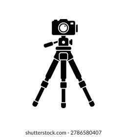 Silhouette of a professional camera mounted on a sturdy tripod, set against a stark white background, evoking a sense of readiness for capturing high-quality photographs or videos in a studio setting.
