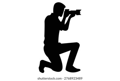 Silhouette of a professional photographer kneeling while taking a photo, symbolizing focus, creativity, and visual storytelling. Suitable for media, journalism, studio, and outdoor photography themes.