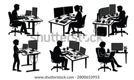 Silhouette of programmer working on laptop at desk