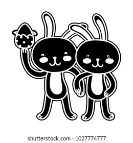 silhouette rabbit couple with hands together and egg easter