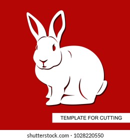 Silhouette of Rabbit  - decor for Easter. Template for laser cutting, wood carving, paper cut and printing. Vector illustration.