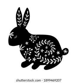 Silhouette of rabbit. Easter Bunnies.  Silhouette of a rabbit with flower pattern. Vector illustration isolated on a white background.