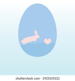 silhouette of rabbit and easter eggs inside an egg with blue gradient background