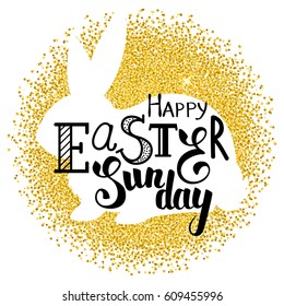Silhouette of rabbit and Easter greeting hand-lettering on a gold dust background. Vector.