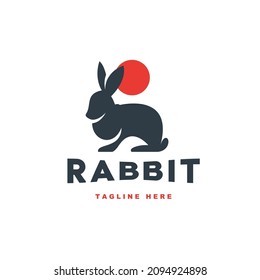 Conejo de silueta, sol y logotipo sencillo para una granja de mamíferos o tienda de mascotas minimalista