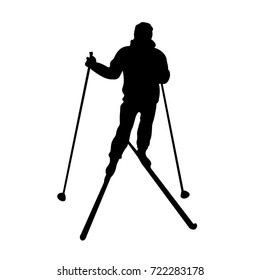 silhouette of a resting skier