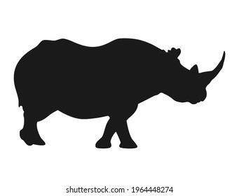 Silhouette of a rhino walking about to go somewhere 