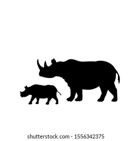 Silhouette of rhino and young small rhino. Vector illustrator