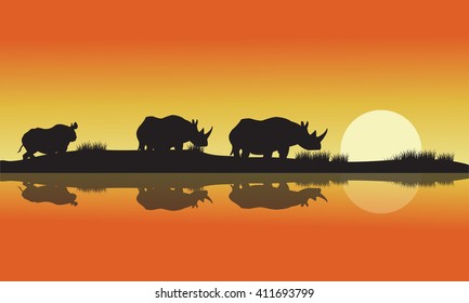 silhouette of a rhinoceros africa Hill at the morning