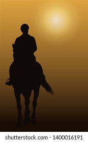 Silhouette of a rider on a horse, full face, against the sunset.