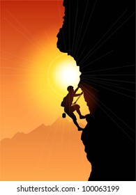 Silhouette of a rock climber against a sunset sky