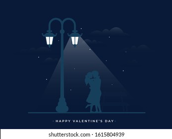 Silhouette Romantic Couple Hugging Under Street Lamp on Night View Blue Background for Happy Valentine's Day.