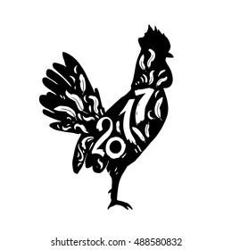 Silhouette of a rooster with lettering year 2017. Christmas elements for your design