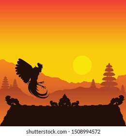 Silhouette of a rooster on the roof on Bali Island. Rooster soars above the roof during sunset.