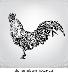 Silhouette of a rooster in an ornament