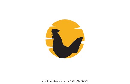 silhouette rooster with sunset logo symbol vector icon illustration graphic design