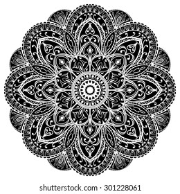 Silhouette of a round ornament. Black mandala isolated on white background. Stencil for oriental ornament.