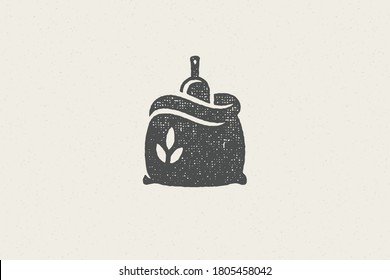 Silhouette sack of wheat flour with scoop designed for grain farming industry hand drawn stamp effect vector illustration. Grunge texture for packaging design or label decoration.