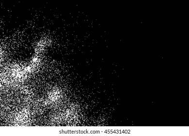 Silhouette of salt flakes spread on the flat surface or table. Top view of dust, sand blow. Abstract grainy texture isolated on black background.