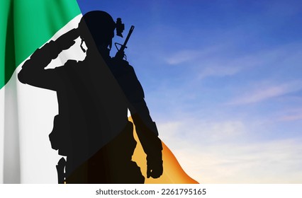 Silhouette of a saluting soldier on background of Irish flag against the sky. Concept - Armed Forces, Memorial Day. EPS10 vector