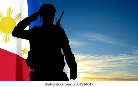 Silhouette of a saluting soldier with Philippines flag on background of sky. Concept - Independence day. EPS10 vector