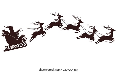 Silhouette of Santa Claus riding sleigh 