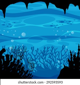 Silhouette scene from underwater with coral reef