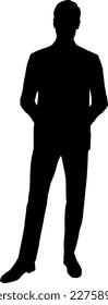 Silhouette: serious businessman with suit and clasped hands from the front