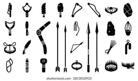 Silhouette set of prehistoric hunting tools and tribal weapons featuring spears, arrows, boomerangs, animal traps, slingshots, stone knives, and primitive survival equipment icons.