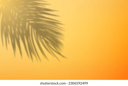 silhouette or shadow of palm leaves on orange wall, design for summer background.