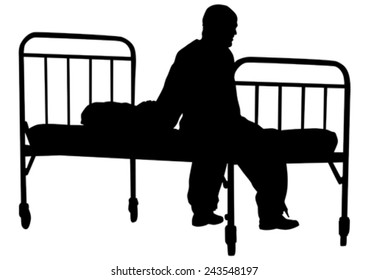 Silhouette of sick man in pajamas near bed