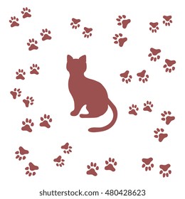 Silhouette of sitting cat and animal traces on a white background