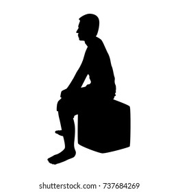 Silhouette of sitting man on white